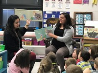 Reading to the class.